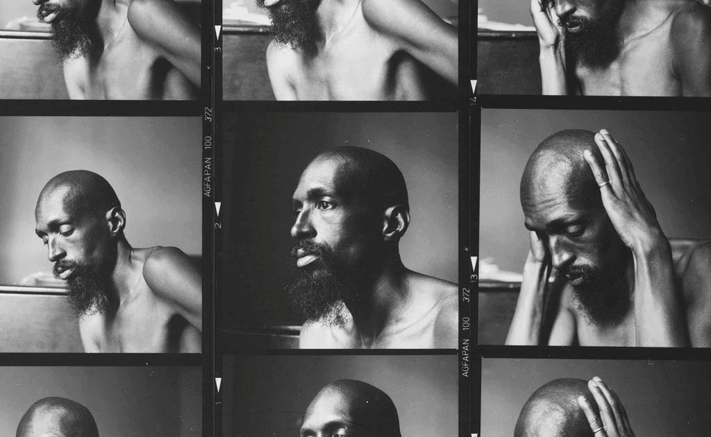 A series of black and white portraits featuring a shirtless man with a beard in various contemplative poses.